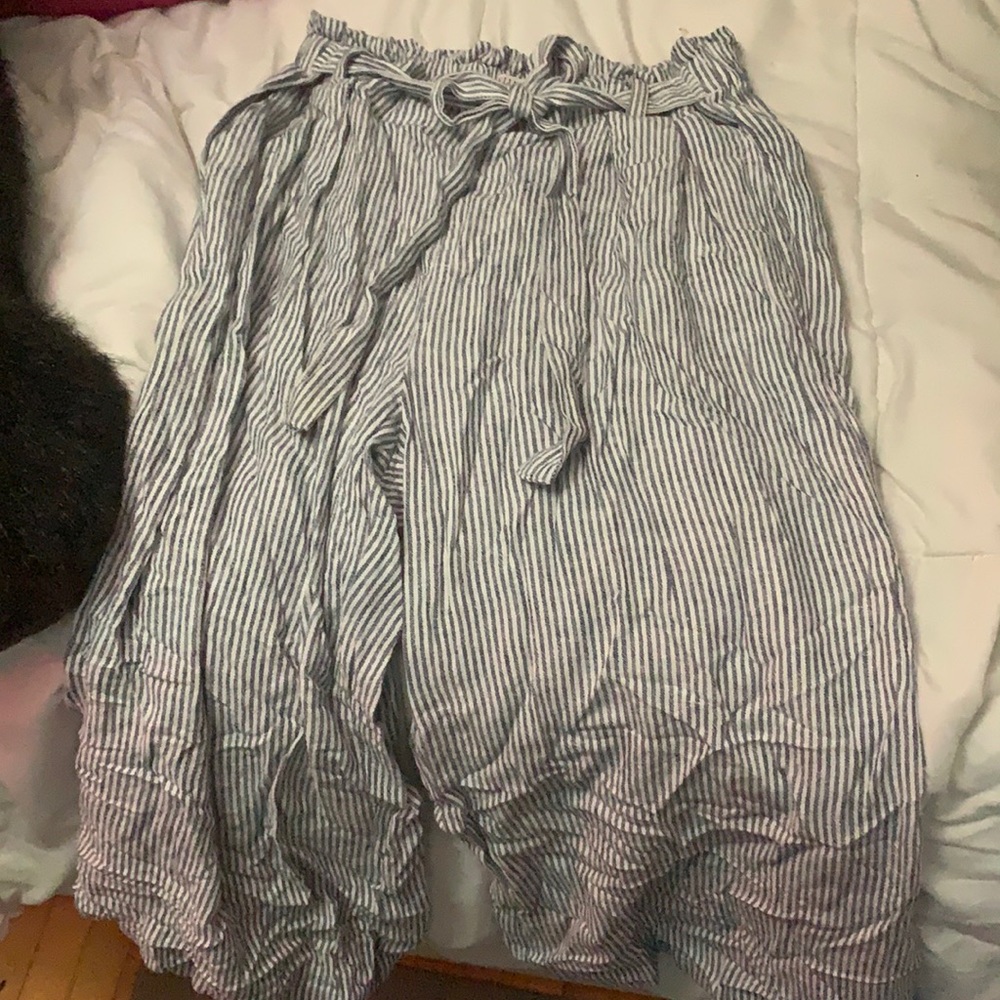 Linen/hasn’t been worn,in good condition needs to be ironed to get wrinkles out.